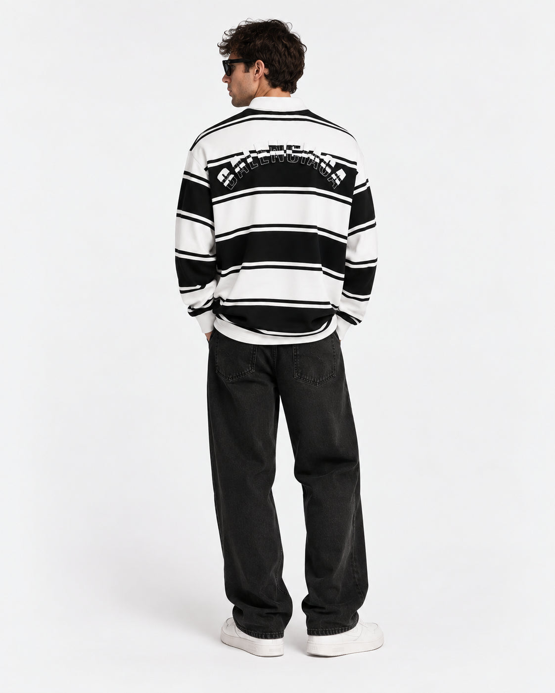 Polo a righe bianche/nere in cotone