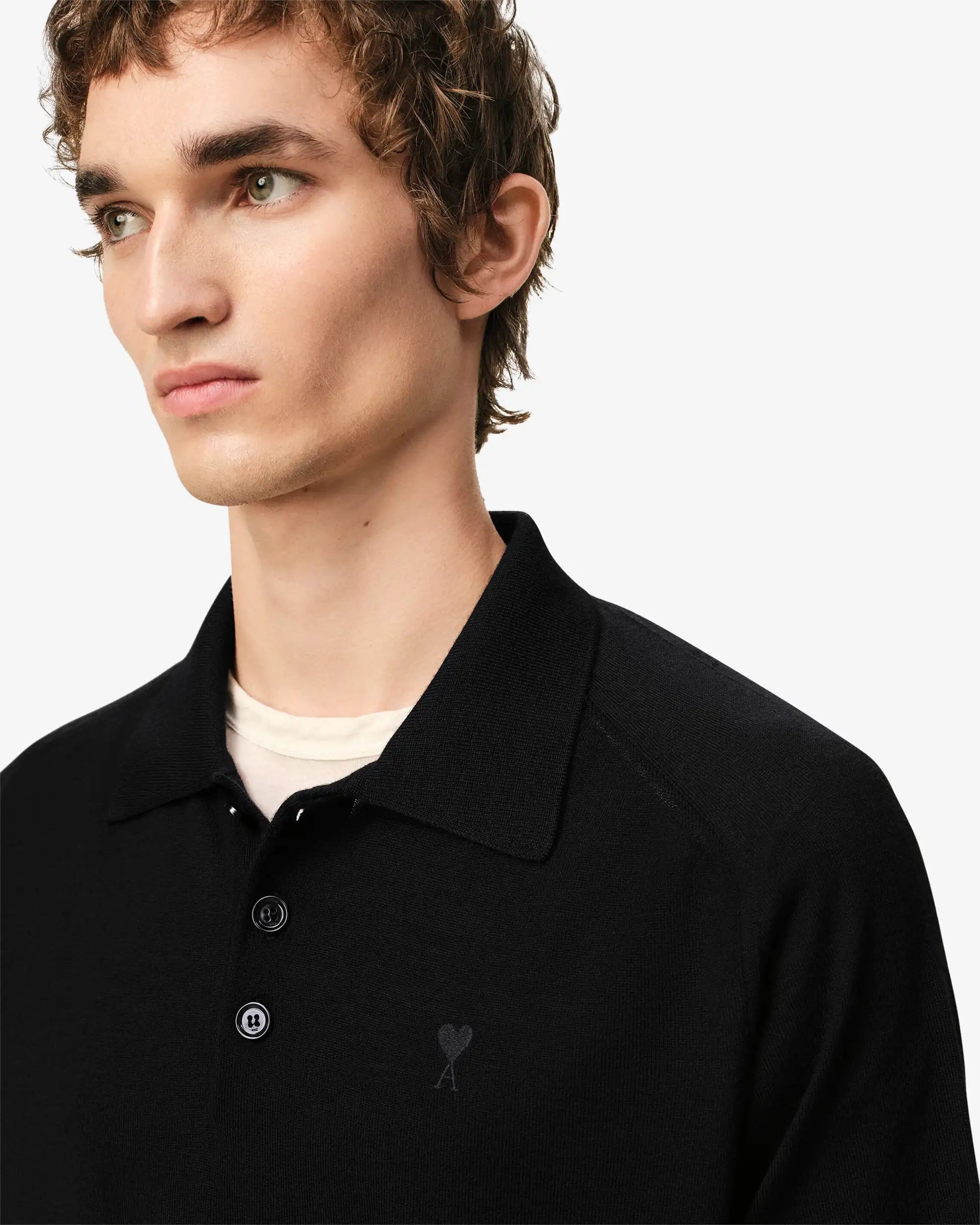 Polo in maglia di lana merino