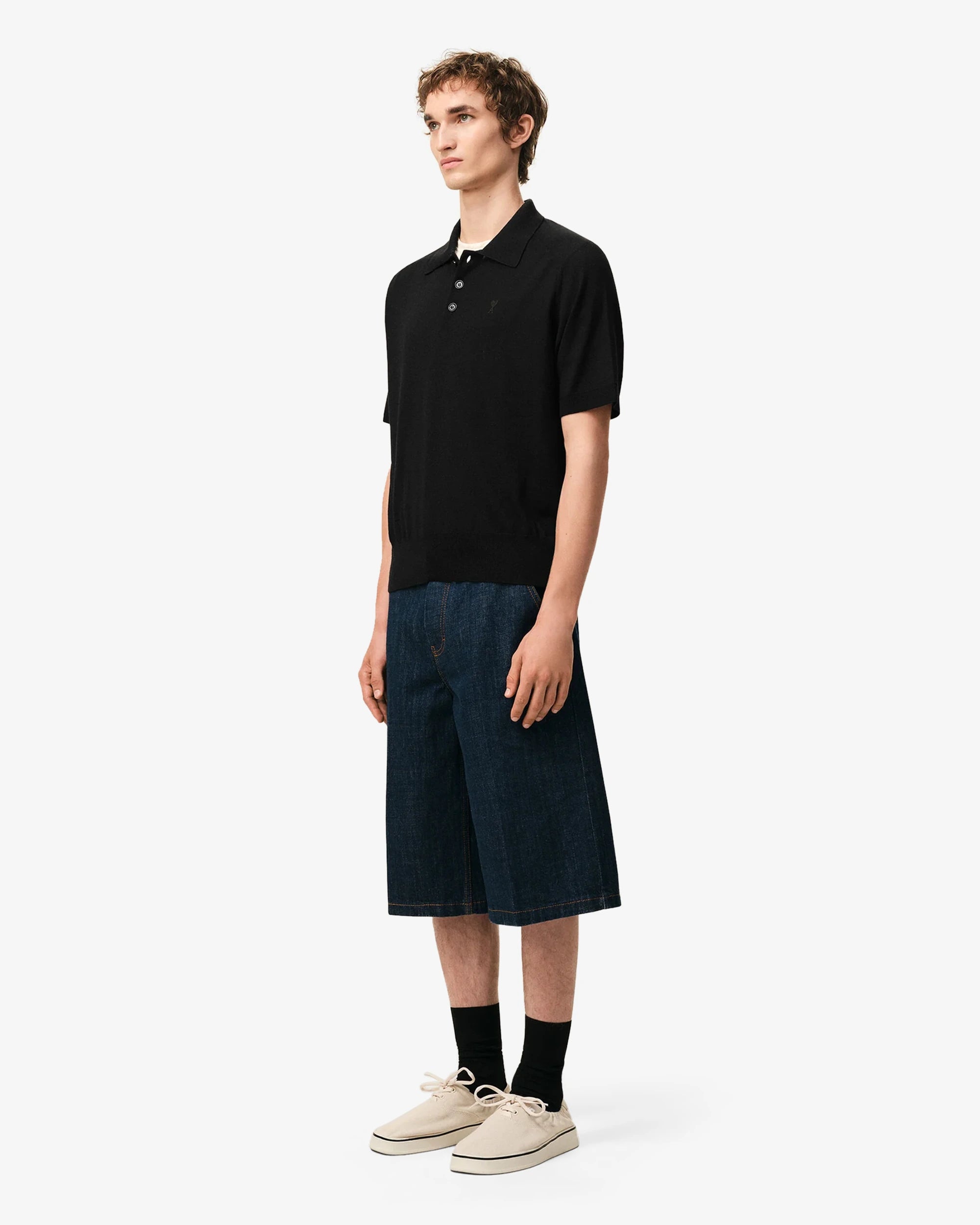 Polo in maglia di lana merino
